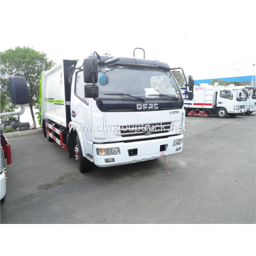 Compactor garbage truck with bin for truck